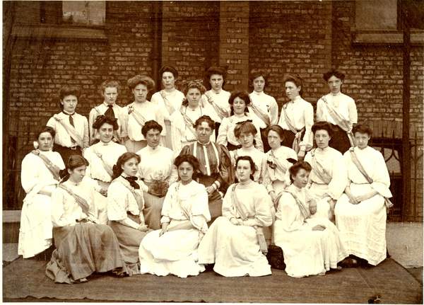 Head Mistress, Sara Burstall, with girls wearing Speech Day sashes